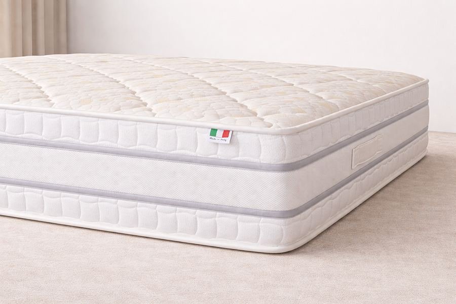 Détail du tissu et de l'étiquette du matelas Opal Confort