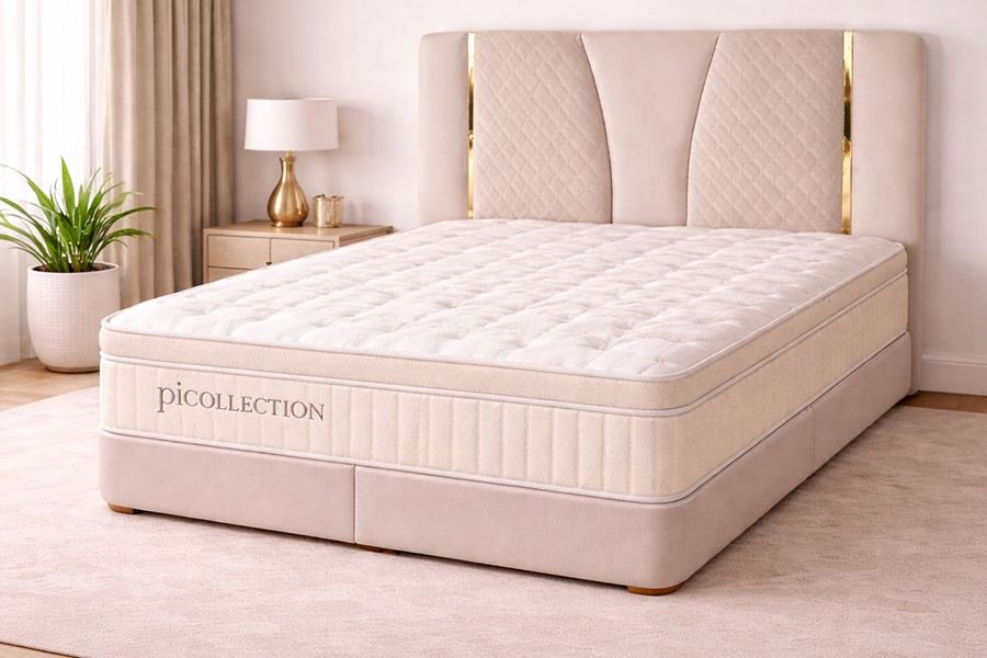 Matelas Picollection Blanc piCollection installé sur un lit